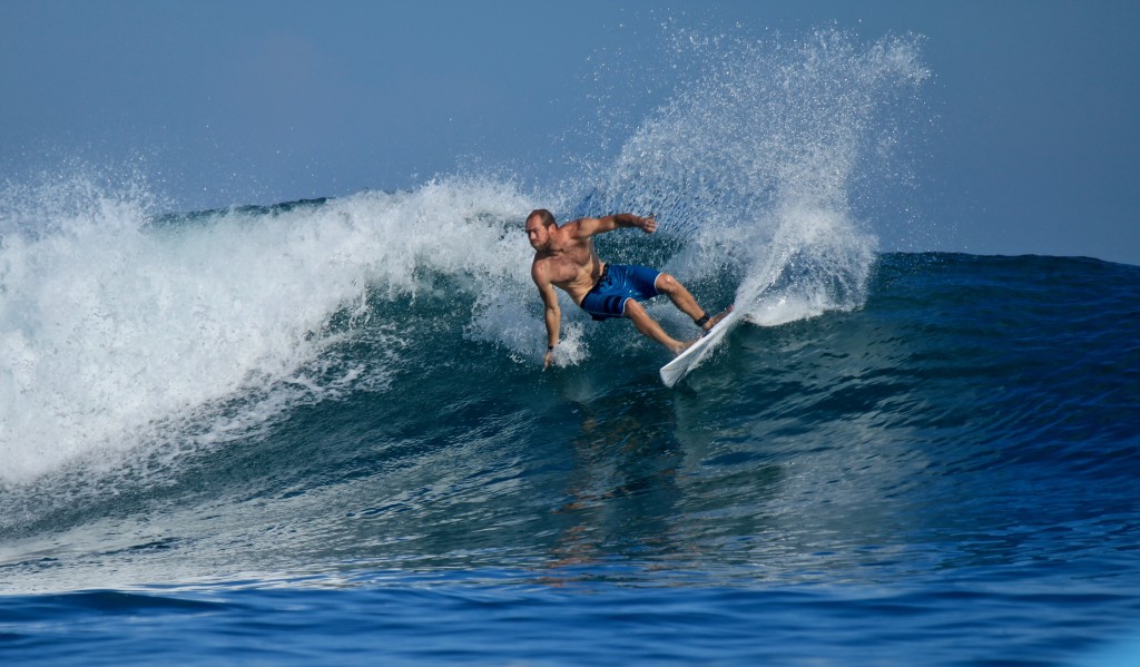 Chris making a perfect turn on a perfect indo wave
